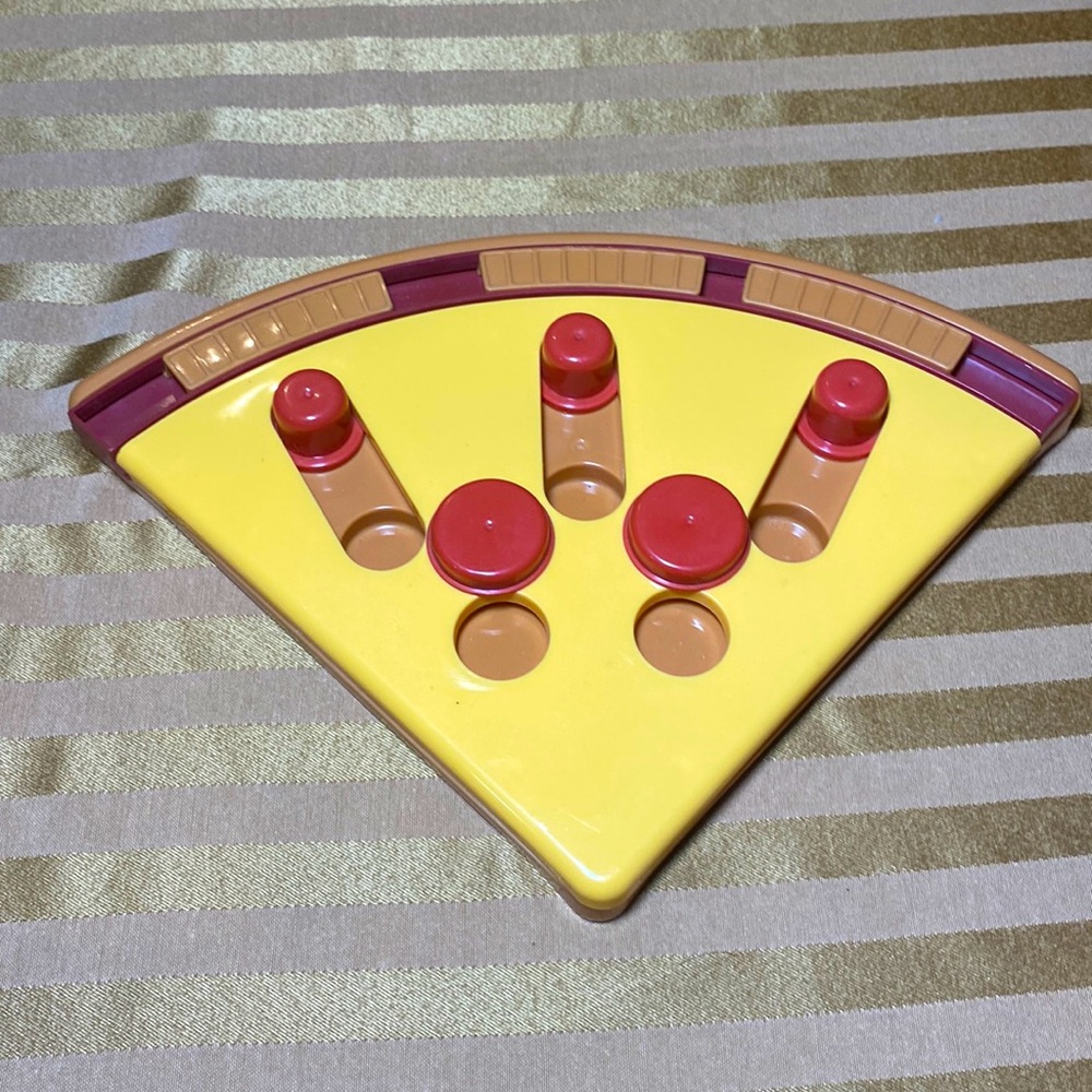 Pizza "find the treat" toy with non slide padding